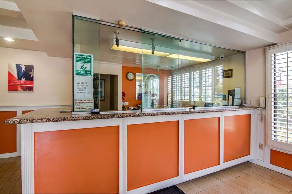 at the front desk of Motel 6 in Los Angeles